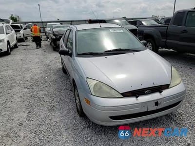 Zdjęcie 13 z 14 samochodu: 2002 FORD FOCUS LX VIN:1FAFP33P72W253645 - miniatura