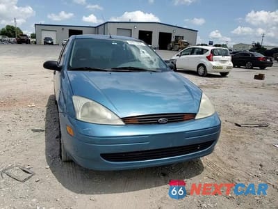 Zdjęcie 13 z 13 samochodu: 2001 FORD FOCUS LX VIN:1FAFP33P51W122583 - miniatura