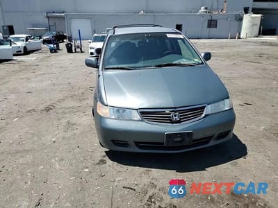 Zdjęcie 14 z 15 samochodu: 2001 HONDA ODYSSEY EX VIN:2HKRL18651H569136 - miniatura