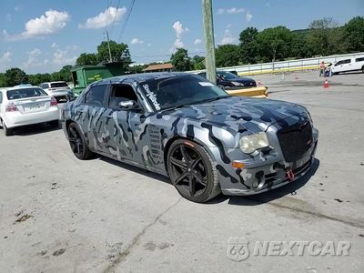 Zdjęcie 13 z 14 samochodu: 2006 CHRYSLER 300C SRT-8 VIN:2C3LA73W46H216929 - miniatura