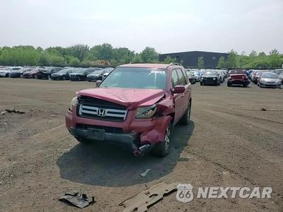 Zdjęcie 13 z 14 samochodu: 2006 HONDA PILOT EX VIN:2HKYF18426H502972 - miniatura