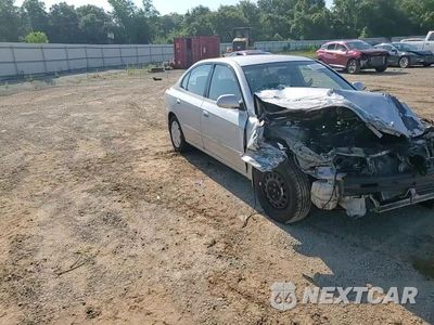 Zdjęcie 10 z 14 samochodu: 2002 HYUNDAI ELANTRA GLS VIN:KMHDN45DX2U280135 - miniatura