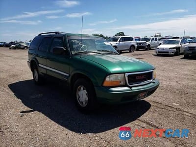 Zdjęcie 11 z 15 samochodu: 1999 GMC JIMMY VIN:1GKCS13W8X2516655 - miniatura