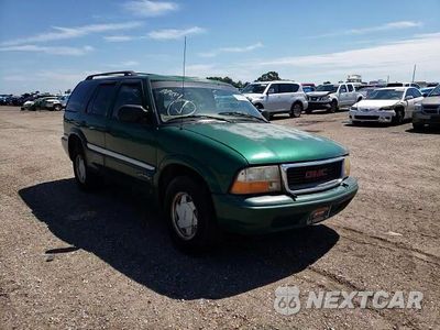 Zdjęcie 11 z 15 samochodu: 1999 GMC JIMMY VIN:1GKCS13W8X2516655 - miniatura