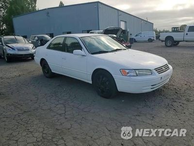 Zdjęcie 13 z 14 samochodu: 1999 TOYOTA CAMRY CE VIN:JT2BF22K9W0115263 - miniatura