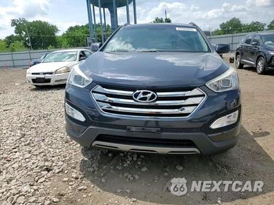 Zdjęcie 14 z 15 samochodu: 2013 HYUNDAI SANTA FE SPORT VIN:5XYZU3LB5DG030640 - miniatura