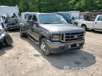 Zdjęcie 14 z 15 samochodu: 2004 FORD F350 SUPER DUTY VIN:1FTWW32S34EA62817 - miniatura