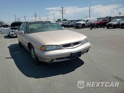 Zdjęcie 13 z 14 samochodu: 1999 PONTIAC BONNEVILLE SE VIN:1G2HX52K1XH233699 - miniatura