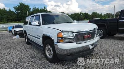 Zdjęcie 14 z 15 samochodu: 2005 GMC YUKON XL C1500 VIN:1GKEC16Z35J123936 - miniatura