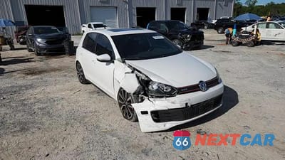 Zdjęcie 13 z 14 samochodu: 2011 VOLKSWAGEN GTI VIN:WVWGV7AJ5BW268624 - miniatura