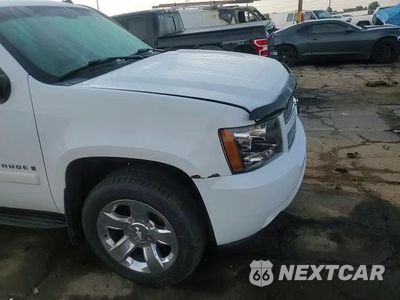 Zdjęcie 14 z 15 samochodu: 2007 CHEVROLET TAHOE K1500 VIN:1GNFK13097J383373 - miniatura