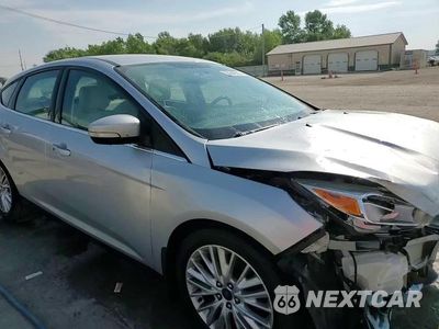 Zdjęcie 14 z 14 samochodu: 2016 FORD FOCUS TITANIUM VIN:1FADP3N21GL256428 - miniatura