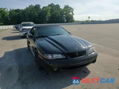 Zdjęcie 13 z 14 samochodu: 1996 FORD MUSTANG COBRA VIN:1FALP46V2TF190068 - miniatura