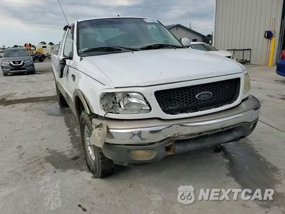 Zdjęcie 13 z 14 samochodu: 2002 FORD F150 VIN:1FTRX18W02NA81542 - miniatura