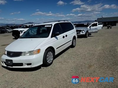 Zdjęcie 14 z 15 samochodu: 2001 HONDA ODYSSEY LX VIN:2HKRL18561H529123 - miniatura