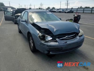 Zdjęcie 13 z 13 samochodu: 2000 FORD TAURUS SES VIN:1FAFP5524YG152806 - miniatura