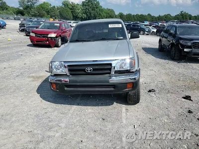 Zdjęcie 13 z 14 samochodu: 2000 TOYOTA TACOMA XTRACAB VIN:5TEWN72N2YZ690570 - miniatura