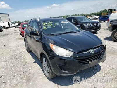 Zdjęcie 13 z 14 samochodu: 2011 HYUNDAI TUCSON GLS VIN:KM8JUCAC9BU172795 - miniatura
