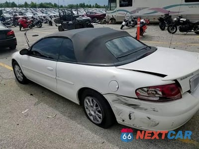 Zdjęcie 13 z 14 samochodu: 2005 CHRYSLER SEBRING GTC VIN:1C3EL75R45N614237 - miniatura