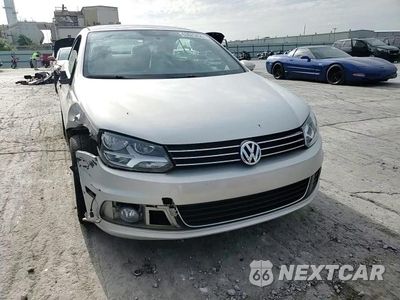 Zdjęcie 13 z 14 samochodu: 2012 VOLKSWAGEN EOS KOMFORT VIN:WVWBW7AH7CV022413 - miniatura