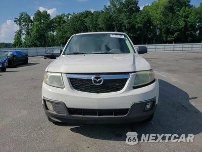 Zdjęcie 14 z 15 samochodu: 2010 MAZDA TRIBUTE I VIN:4F2CY0C74AKM02754 - miniatura