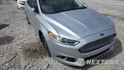 Zdjęcie 13 z 14 samochodu: 2014 FORD FUSION TITANIUM VIN:3FA6P0K92ER320449 - miniatura