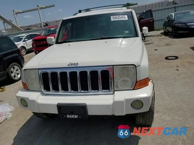 Zdjęcie 14 z 15 samochodu: 2010 JEEP COMMANDER LIMITED VIN:1J4RG5GT4AC109443 - miniatura