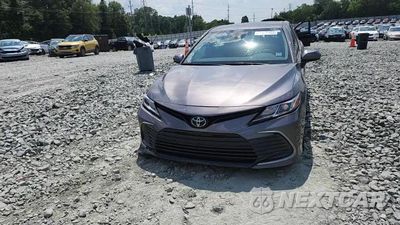 Zdjęcie 13 z 14 samochodu: 2023 TOYOTA CAMRY LE VIN:4T1C11AK9PU760216 - miniatura