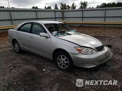 Zdjęcie 13 z 14 samochodu: 2003 TOYOTA CAMRY LE VIN:4T1BE32K33U696114 - miniatura