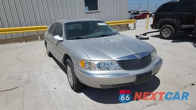 Zdjęcie 13 z 14 samochodu: 2002 LINCOLN CONTINENTAL VIN:1LNHM97V72Y693131 - miniatura