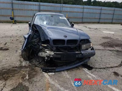 Zdjęcie 14 z 15 samochodu: 2001 BMW 740 IL VIN:WBAGH83431DP25006 - miniatura