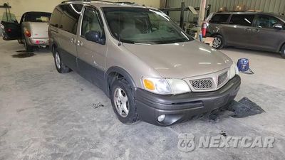 Zdjęcie 14 z 15 samochodu: 2003 PONTIAC MONTANA VIN:1GMDX03E23D168820 - miniatura