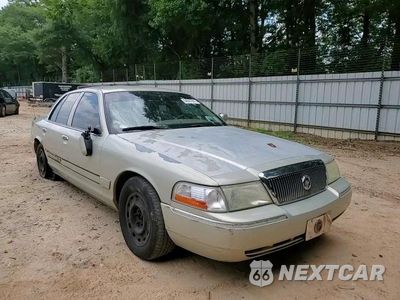 Zdjęcie 13 z 14 samochodu: 2005 MERCURY GRAND MARQUIS GS VIN:2MEFM74W05X666224 - miniatura
