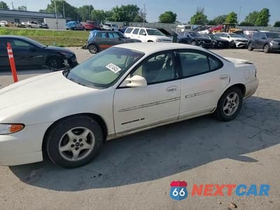Zdjęcie 13 z 14 samochodu: 2002 PONTIAC GRAND PRIX SE VIN:1G2WK52J82F279953 - miniatura