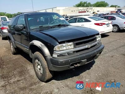 Zdjęcie 14 z 15 samochodu: 2003 CHEVROLET BLAZER VIN:1GNCT18XX3K171656 - miniatura