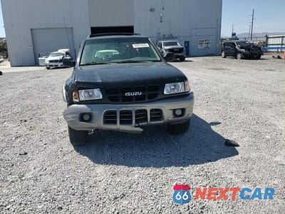 Zdjęcie 14 z 15 samochodu: 2002 ISUZU RODEO S VIN:4S2DM58W324340853 - miniatura