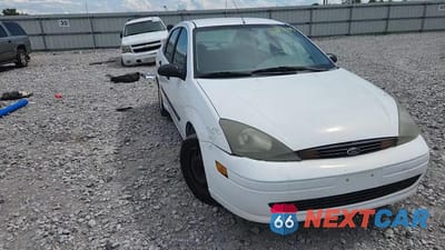 Zdjęcie 13 z 14 samochodu: 2004 FORD FOCUS LX VIN:1FAFP33P84W191529 - miniatura