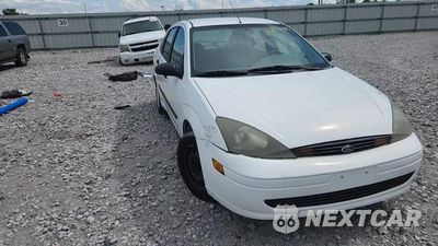 Zdjęcie 13 z 14 samochodu: 2004 FORD FOCUS LX VIN:1FAFP33P84W191529 - miniatura