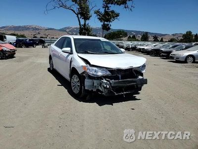 Zdjęcie 13 z 14 samochodu: 2013 TOYOTA CAMRY HYBRID VIN:4T1BD1FK4DU067531 - miniatura