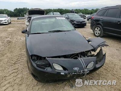 Zdjęcie 13 z 14 samochodu: 2002 FORD ESCORT ZX2 VIN:3FAFP11372R156517 - miniatura