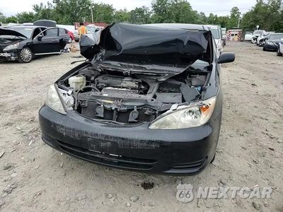 Zdjęcie 13 z 14 samochodu: 2004 TOYOTA CAMRY LE VIN:4T1BE32K44U298296 - miniatura