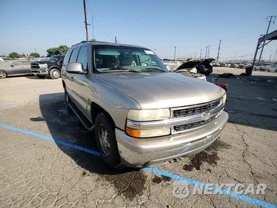 Zdjęcie 14 z 15 samochodu: 2001 CHEVROLET TAHOE C1500 VIN:1GNEC13T41R133700 - miniatura