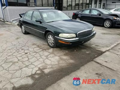 Zdjęcie 13 z 14 samochodu: 2002 BUICK PARK AVENUE VIN:1G4CW54K124109398 - miniatura