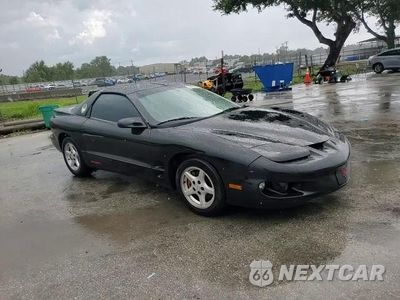 Zdjęcie 13 z 14 samochodu: 1999 PONTIAC FIREBIRD VIN:2G2FS22K7X2232302 - miniatura