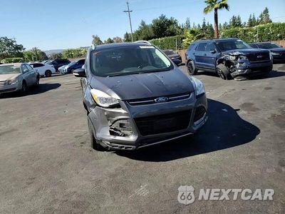 Zdjęcie 14 z 15 samochodu: 2015 FORD ESCAPE TITANIUM VIN:1FMCU0J92FUC43398 - miniatura
