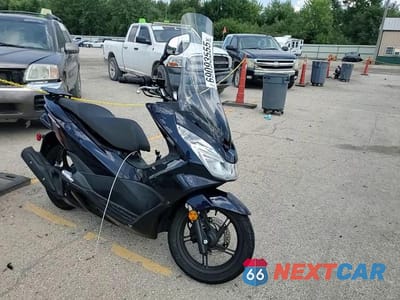 Zdjęcie 10 z 10 samochodu: 2018 HONDA PCX 150 VIN:RLHKF1800JY300559 - miniatura