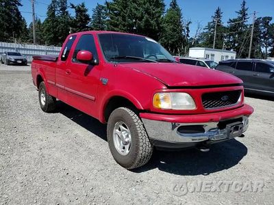 Zdjęcie 13 z 14 samochodu: 1998 FORD F150 VIN:2FTZX18W4WCA82110 - miniatura