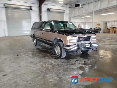Zdjęcie 13 z 14 samochodu: 1994 GMC SIERRA K1500 VIN:1GTEK14KXRE537993 - miniatura