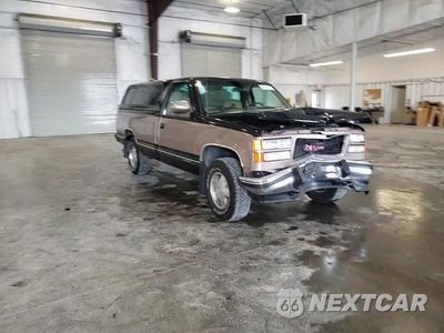 Zdjęcie 13 z 14 samochodu: 1994 GMC SIERRA K1500 VIN:1GTEK14KXRE537993 - miniatura