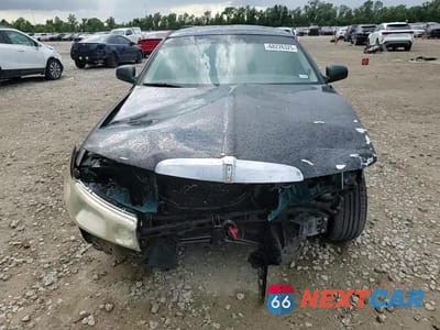 Zdjęcie 14 z 15 samochodu: 2000 LINCOLN TOWN CAR EXECUTIVE VIN:1LNHM81W8YY820974 - miniatura